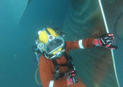 Diver Polishing Propeller